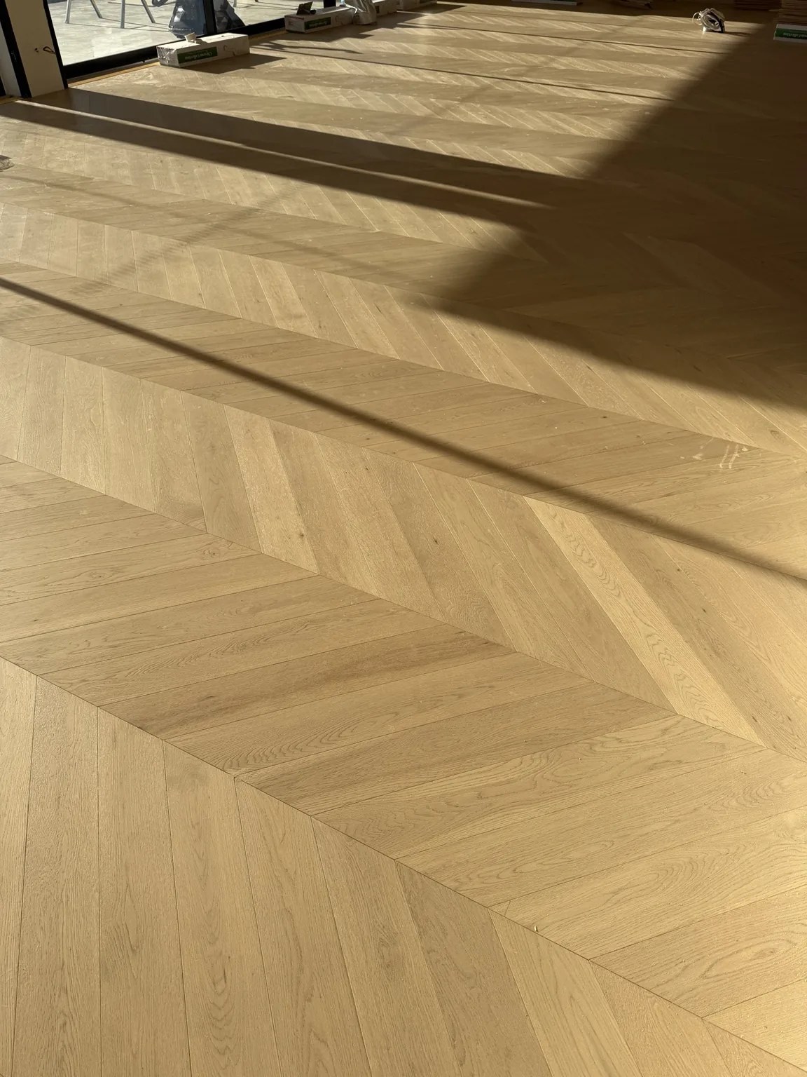 Luxury natural oak chevron flooring installation Sydney