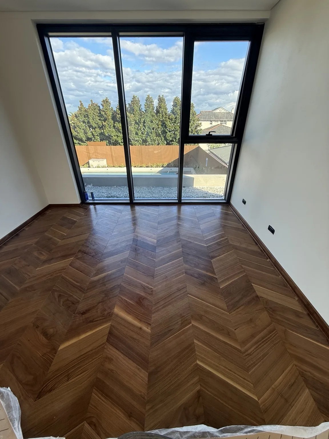 Dark walnut chevron flooring bedroom Sydney