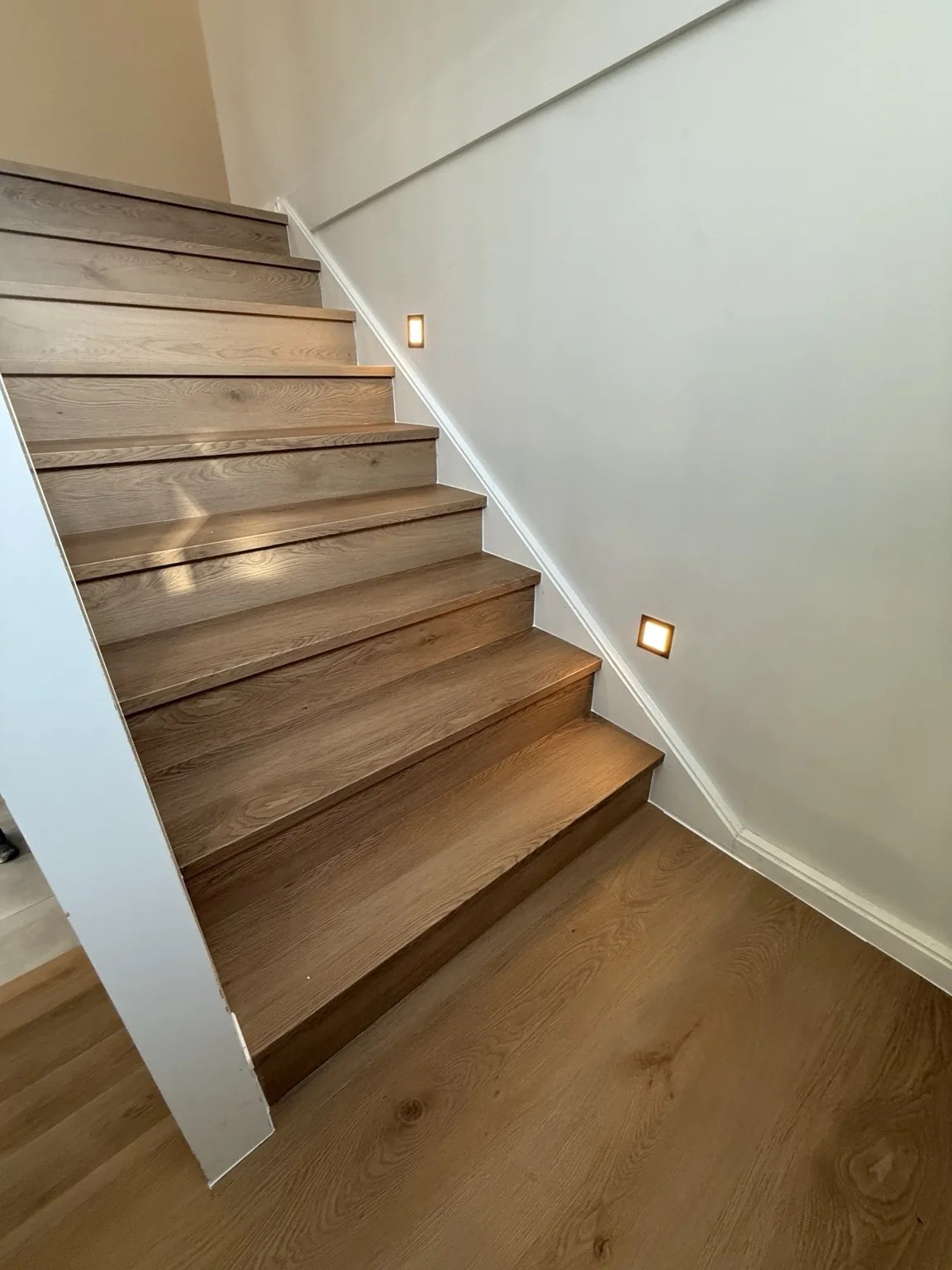 Custom timber winder staircase installation