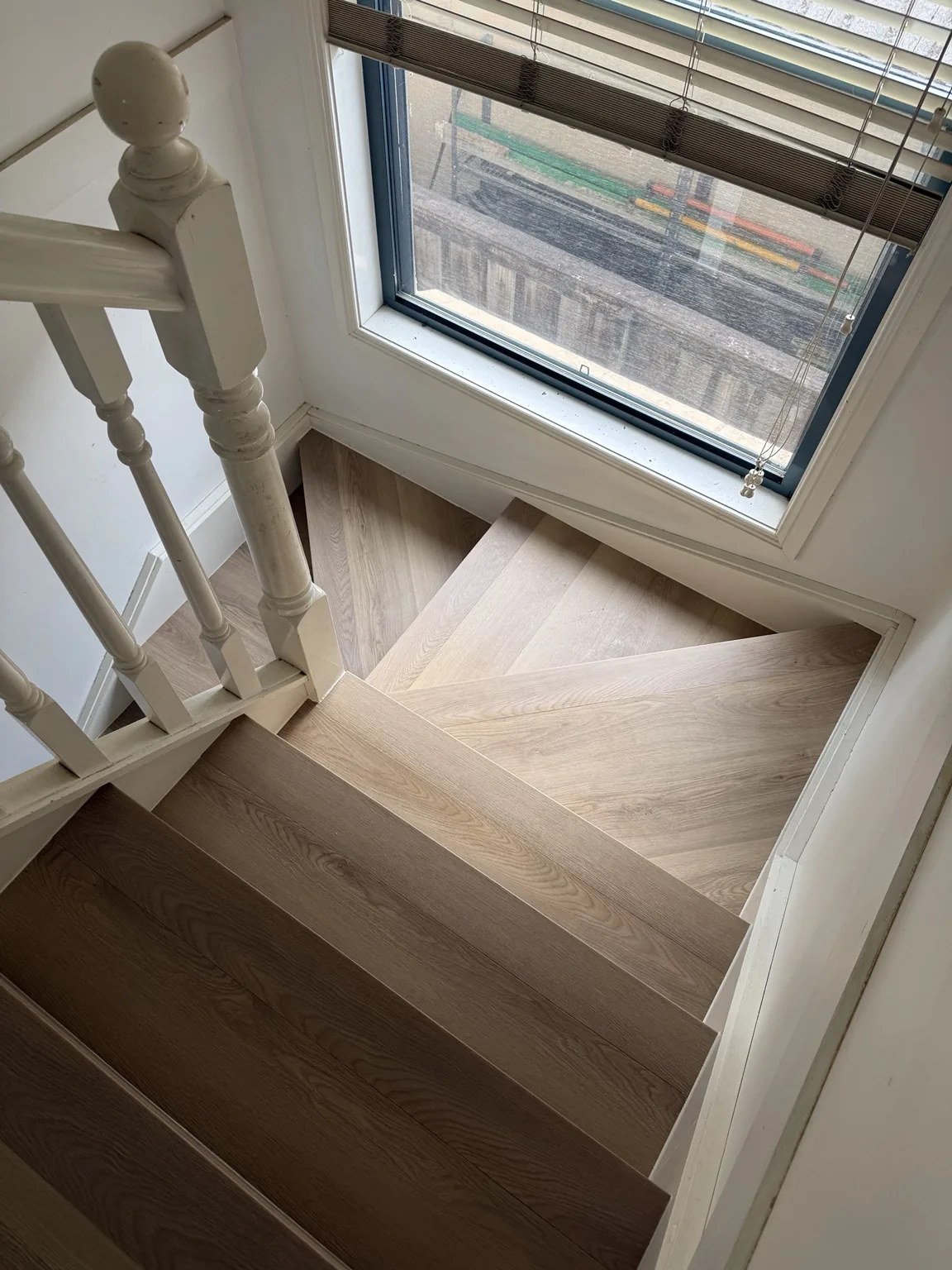 Oak stair landing installation